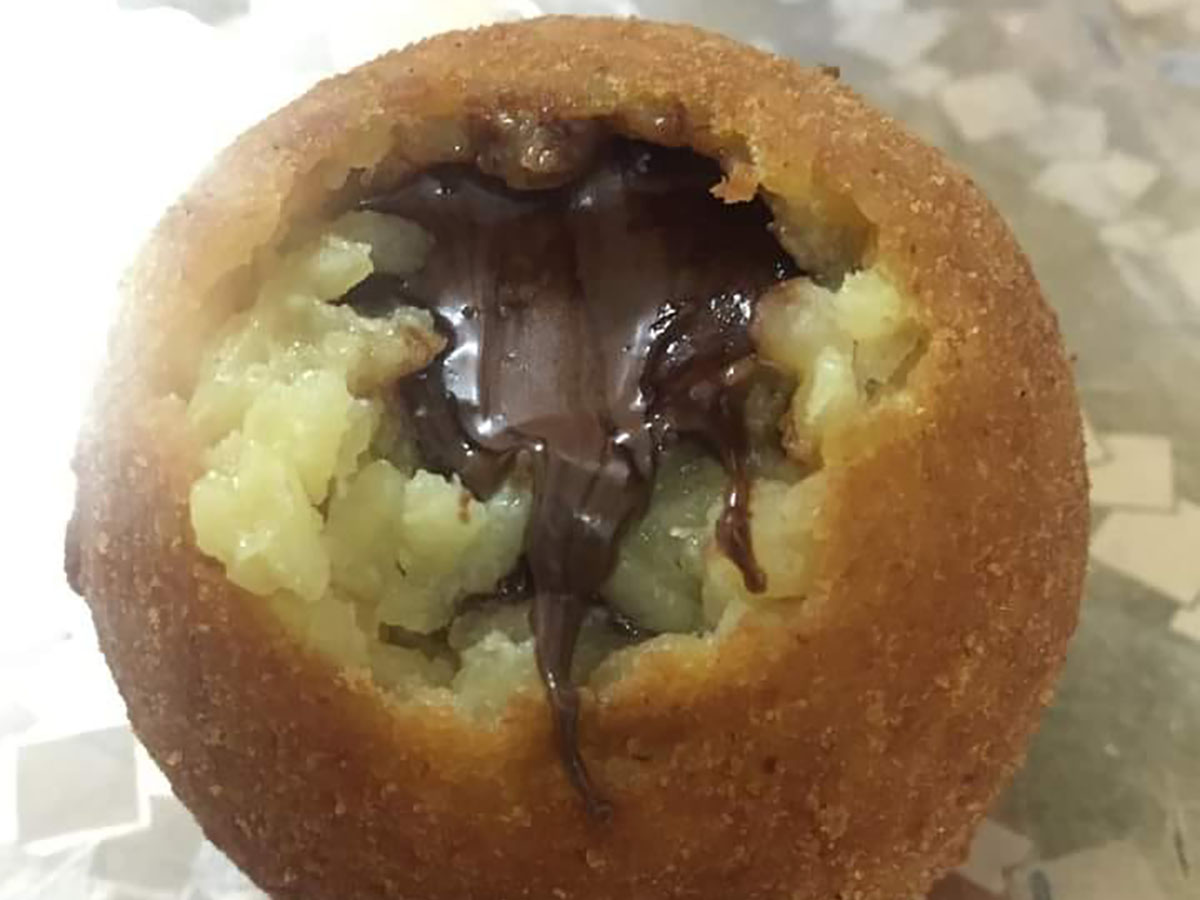 arancine-ripiene-di-nutella,-il-rustico-siciliano-diventa-un-dolce-buonissimo.-facili-e-veloci-da-preparare,-una-tira-l’altra